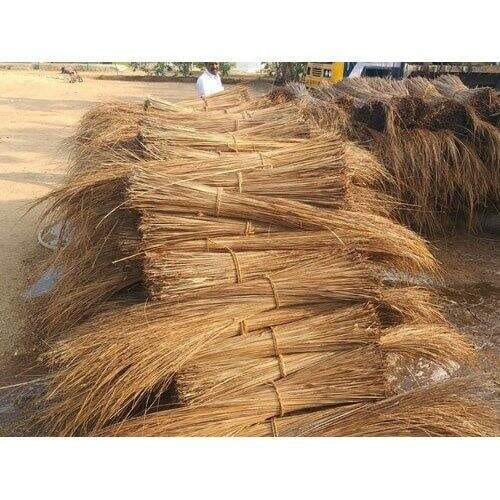 Coconut broom sticks laid out